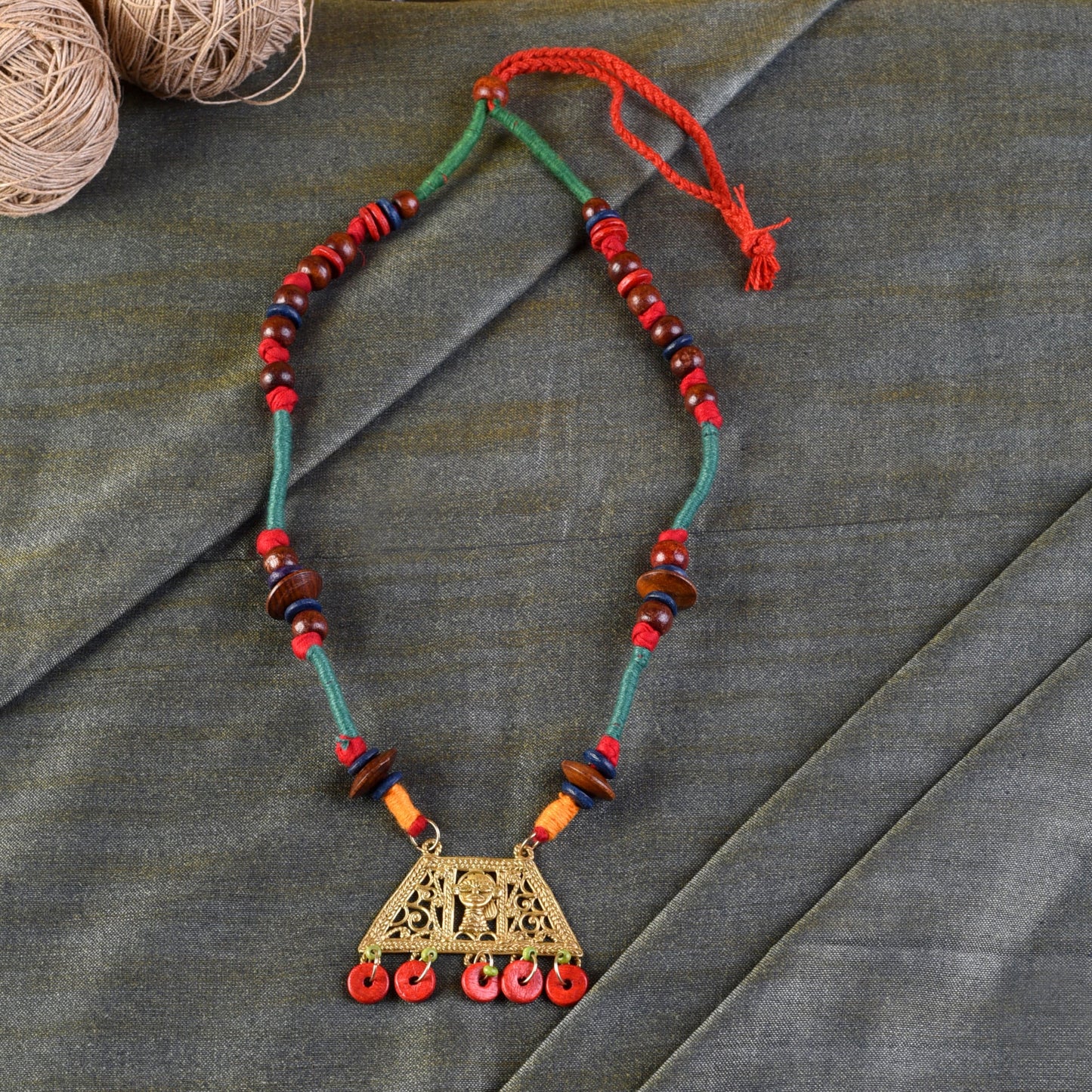 The Empress House Handcrafted Tribal Dokra Necklace in Pumpkin Orange